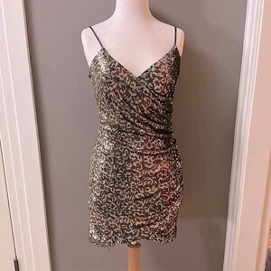 Sparkly black and gold sequin dress